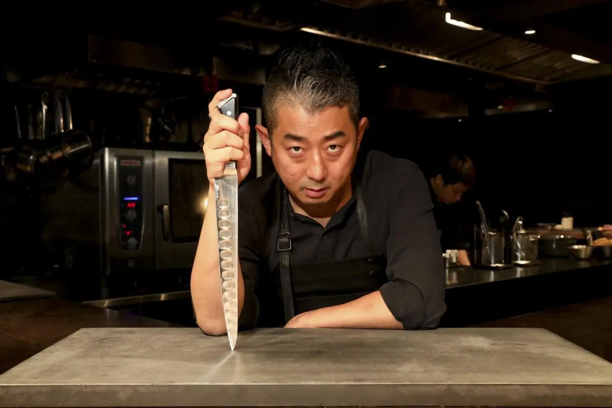 A specialized chef in Wagyumafia restaurant, the luxury Japanese restaurant in Via Riyadh - Cool Inc
